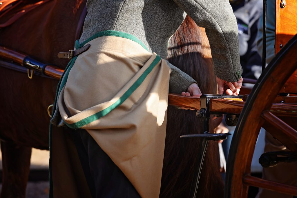 A driver in an apron putting to